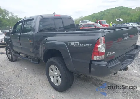 2015 Toyota Tacoma Base V6 из США, поврежденный, VIN 5TFMU4FN9FX030176